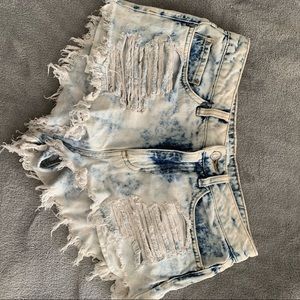 DISTRESSED HIGH WASTED SHORTS